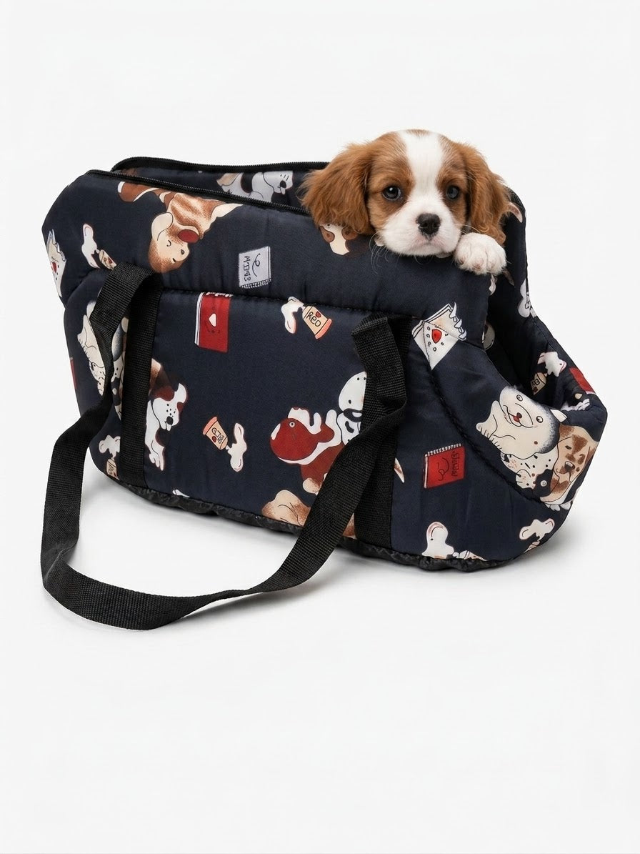 Cavalier King Charles Spaniel μέσα σε μαύρη τσάντα μεταφοράς με cartoon print